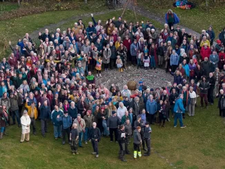 People gathered together in Findhorn Foundation in the UK